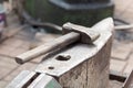Iron hammer on iron anvil Royalty Free Stock Photo