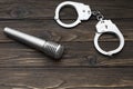 Iron handcuffs for detaining criminals, a microphone