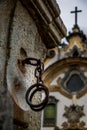 Iron handcuffs used to torture slaves in front of a church