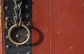 Iron handle with ring on an antique door close-up Royalty Free Stock Photo