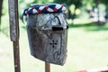 Vintage Iron Medieval Knight Helmet on Wooden Stand - Middle Ages Armor Concept Royalty Free Stock Photo