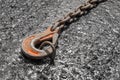 Iron hoist tool hook load heavy lifting weight sling mechanism chain fixed on concrete structure Royalty Free Stock Photo