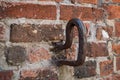 Iron hooks in a brick wall Royalty Free Stock Photo