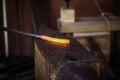 Incandescent iron in an old metal forge
