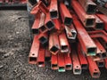 iron industry, constructions, red hollow bars Royalty Free Stock Photo