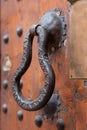 Iron knocker, wooden background, copy space, Marrakesh, Morocco