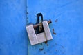 Iron lock on the blue car garage door Royalty Free Stock Photo
