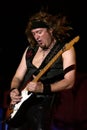 The Iron Maiden during the concert, the guitarist Adrian Smith Royalty Free Stock Photo