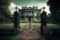 an iron mansion gate set against the backdrop of a rolling green lawn Royalty Free Stock Photo