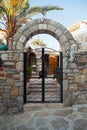 Iron metal beige door of nostalgic house in Datca or Old Datca, Mugla Turkey, june 29 2023