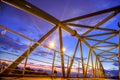 Iron metallic bridge during sunset, in Athens, Greece.