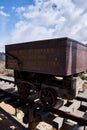 Iron ore cart display on rails Royalty Free Stock Photo