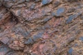 Iron ore texture closeup - natural minerals in the mine. Stone texture of open pit. Extraction of minerals for heavy Royalty Free Stock Photo