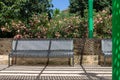 Iron outdoor bench in the garden