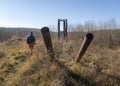 Iron pipes driven into the ground for cables holding the bridge, in the mountains