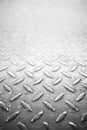 Iron plate pattern metal grid steel sheet floor texture. Rusty steel plate black and white BW texture and perspective