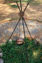 Iron pot soup hang on metal campfire Royalty Free Stock Photo
