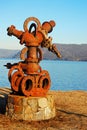 Iron Pump Scuplture on the river