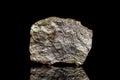 Iron pyrite ore, raw rock on black background, mining and geology