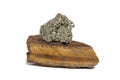 Iron Pyrite Specimen Balanced on Raw Tiger's Eye Royalty Free Stock Photo