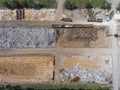 Iron raw materials recycling pile, work machines. Metal waste junkyard. View from above. Royalty Free Stock Photo