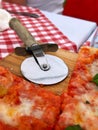 Iron round pizza cutter with wooden handle