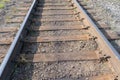 Iron Rusty Train Railway Detail Over Dark Stones Royalty Free Stock Photo