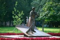 The iron sculpture `The janitor sweeps the yard a broom` in the Aqueduct park on Malakhitovaya Street.