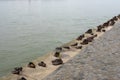 Iron shoes memorial to Jewish people executed WW2 in Budapest Hungary. Shoes on the Danube bank River Royalty Free Stock Photo