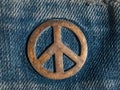 Iron sign of a pacifist on denim