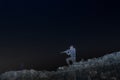 Iron silhouette of a soldier with a gun standing on a trench and looking into the distance, on Mount Bental in the Golan Heights i