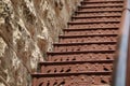 Iron Stairs and Stone Wall Royalty Free Stock Photo