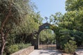 Iron and Stone Masonry Gate with Maltese Cross above it in Poble Espanyol, Barcelona, Spain Royalty Free Stock Photo