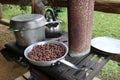 Iron stove making chocolate from cocoa beans