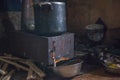 Iron stove on wood, life of the Eskimo of Alaska Royalty Free Stock Photo