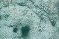 iron surface is covered with old green paint texture background Royalty Free Stock Photo