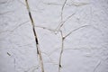 The iron surface is painted with white paint with cracks Royalty Free Stock Photo