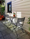 Iron table and chairs at the outdoor dining area at a cafe in the centre of Greytown Wairarapa New Zealand