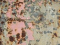 Iron texture with aged paint of different colors and rust