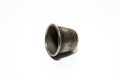 Iron thimble for hand embroidery on a white background Royalty Free Stock Photo