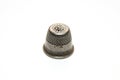 Iron thimble for hand embroidery on a white background Royalty Free Stock Photo