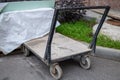 Iron trolley on rubber wheels, old, worn Superior and wear resistant
