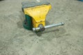 The iron vise, which is green on the workshop floor