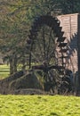 Old iron waterwheel in the winter sun.