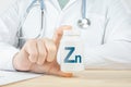 Essential supplement Zinc Zn for human. doctor recommends taking Zinc. doctor talks about Benefits of Zn. Zinc - Health Concept.