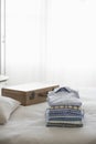 Ironed And Folded Shirts On Bed Royalty Free Stock Photo