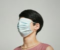 Ironic portrait of woman with full face mask. Royalty Free Stock Photo