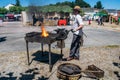 Ironworker working iron on a display