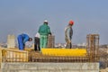 Ironworkers install reinforcing steel for concrete slab 2 Royalty Free Stock Photo