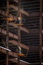 Ironworkers with safety lines working on the outside of steel framing Royalty Free Stock Photo